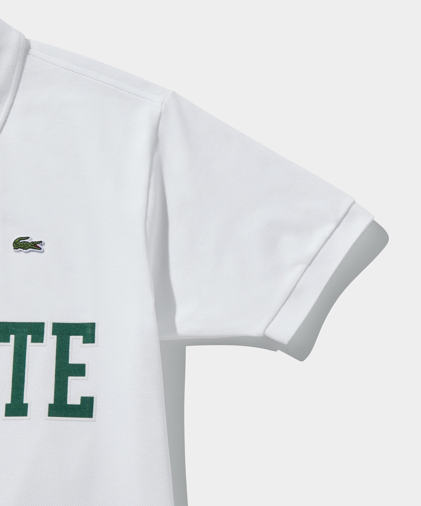 LACOSTE オーバーサイズネームプリントポロシャツ