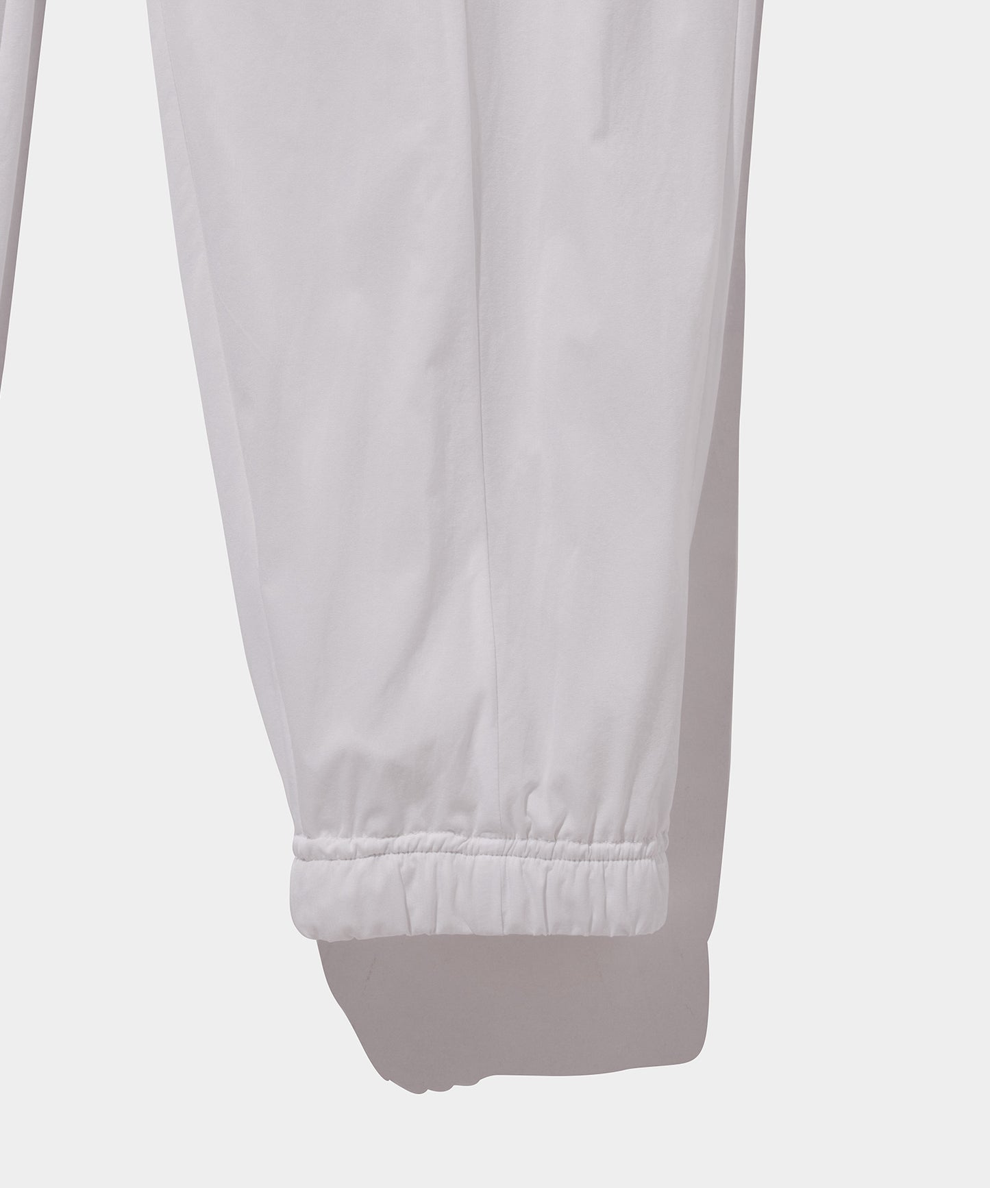 WOVEN NYLON LONG PANTS WHITE