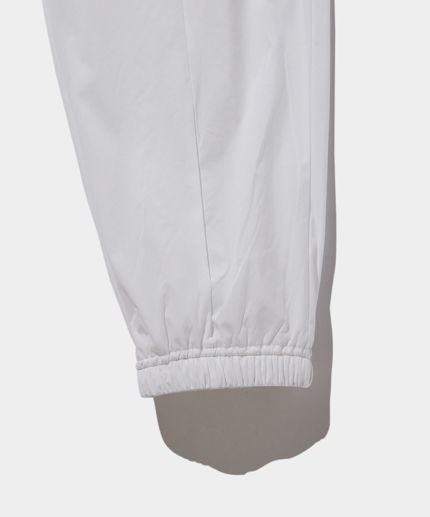 WOVEN NYLON LONG PANTS WHITE