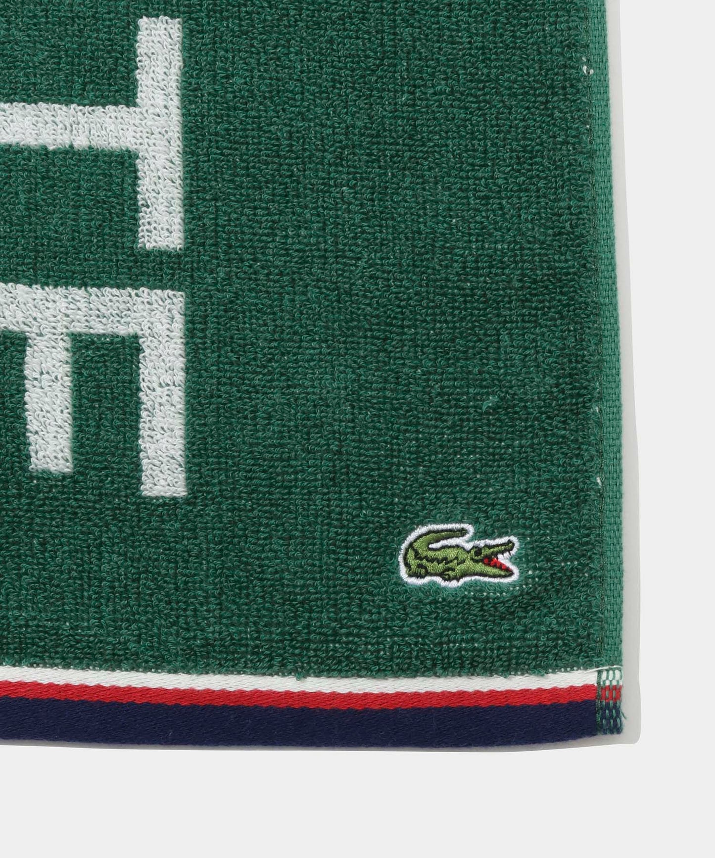 LACOSTE ブランドネームロゴマフラータオル LN009J