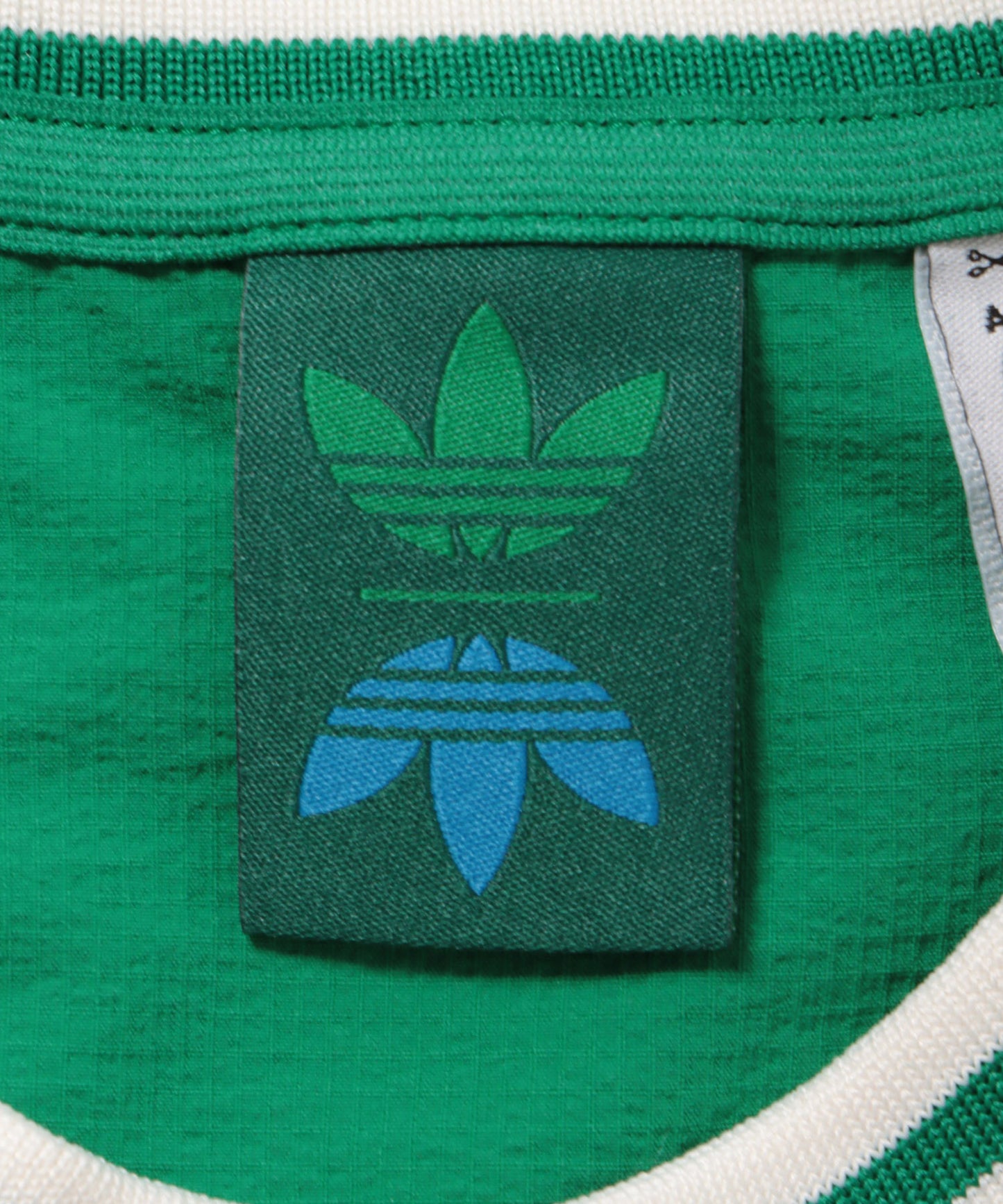 【adidas】ROLLING LINKS 撥水クルーネックウィンド GREEN